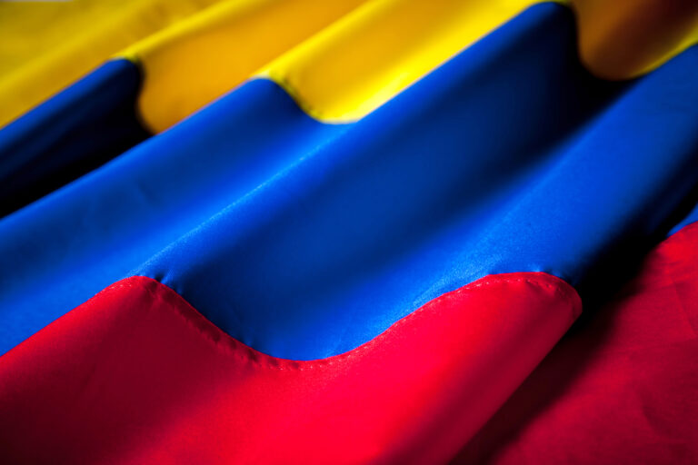 abstract-close-up-of-yellow-blue-and-red-fabric-2026-01-09-14-37-01-utc