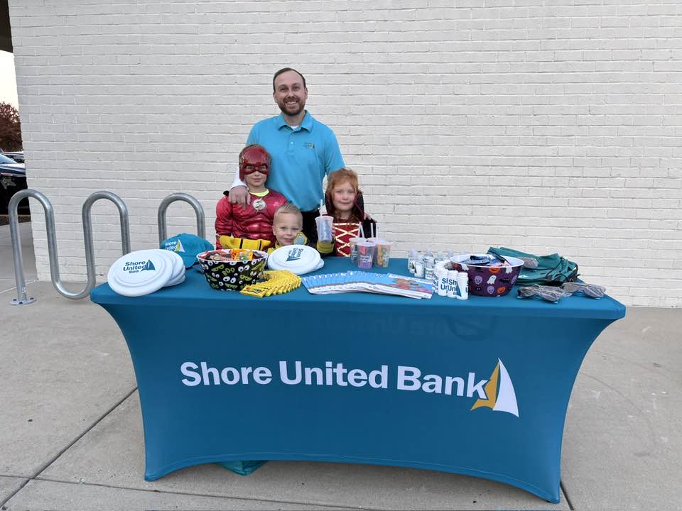 Shore United Bank representatives participating in a community event.